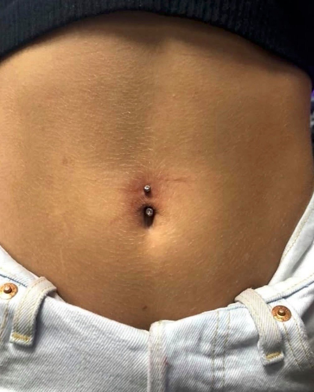 Navel piercing by San Diego Piercing Company