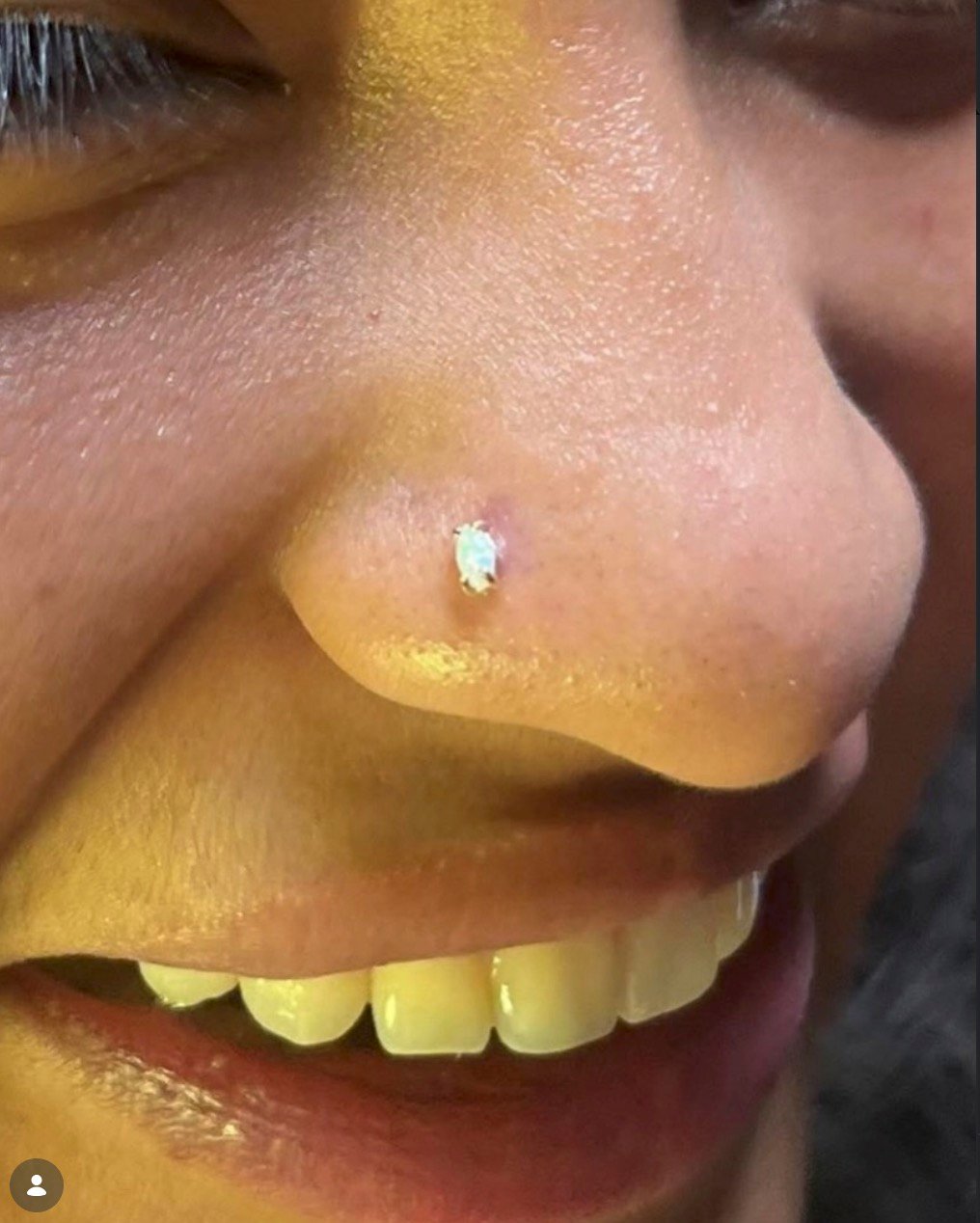 Nostril piercing with a gem stud, San Diego Piercing Company