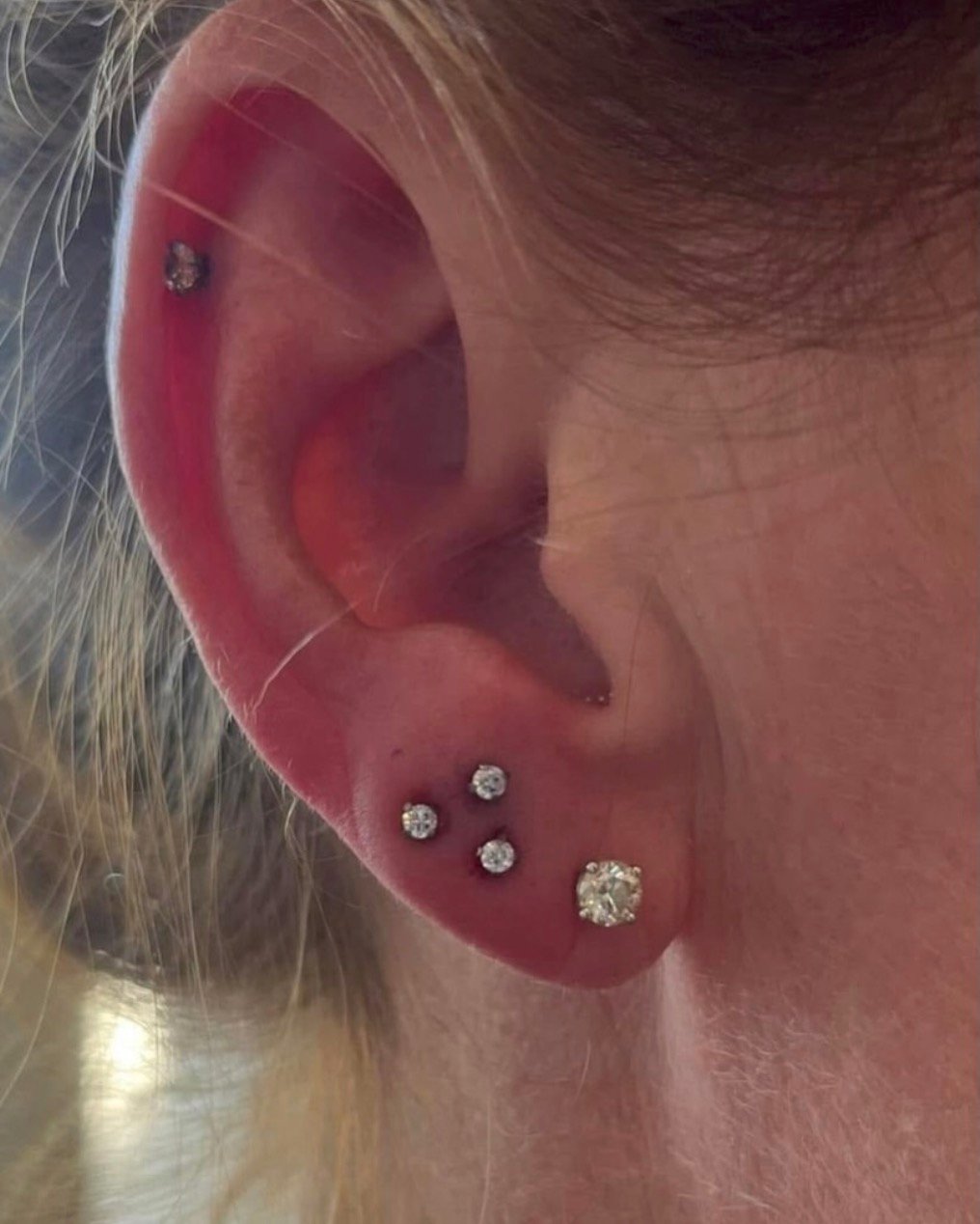 Rook and helix cartilage piercings, San Diego Piercing Company
