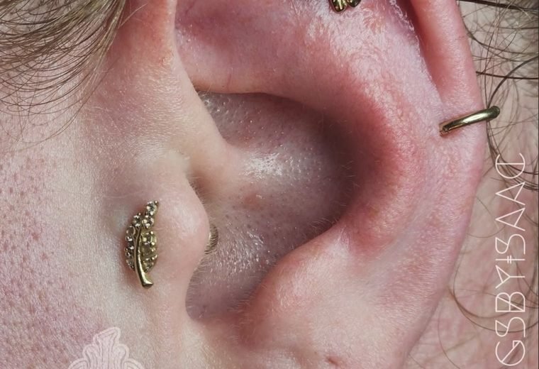 Multiple ear piercings including helix and conch, San Diego