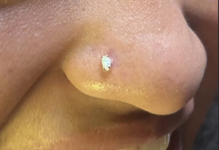 Nostril piercing with a gem stud, San Diego Piercing Company