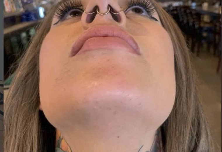 Septum piercing by a professional piercer in San Diego